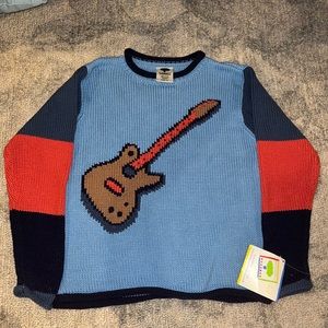 Thick knitted guitar sweater